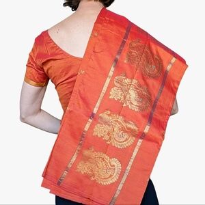 Pretty sunset orange saree w top, peacock palu in Orange, gold, pink. Cotton